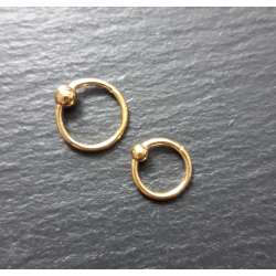 18K Gold Steel Segment Ring...